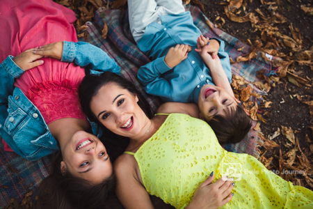 Family portrait in wood; mother and children