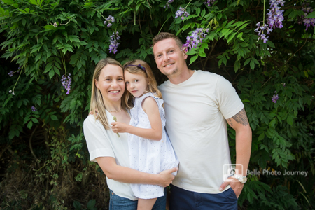 Family photo in front of flower wall, Forty Hall, Enfield