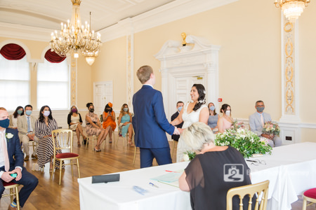 Micro covid wedding guests wearing masks