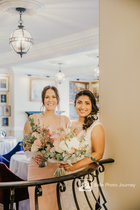 Bride and bridesmaid portrait - Nelson Bar balcony